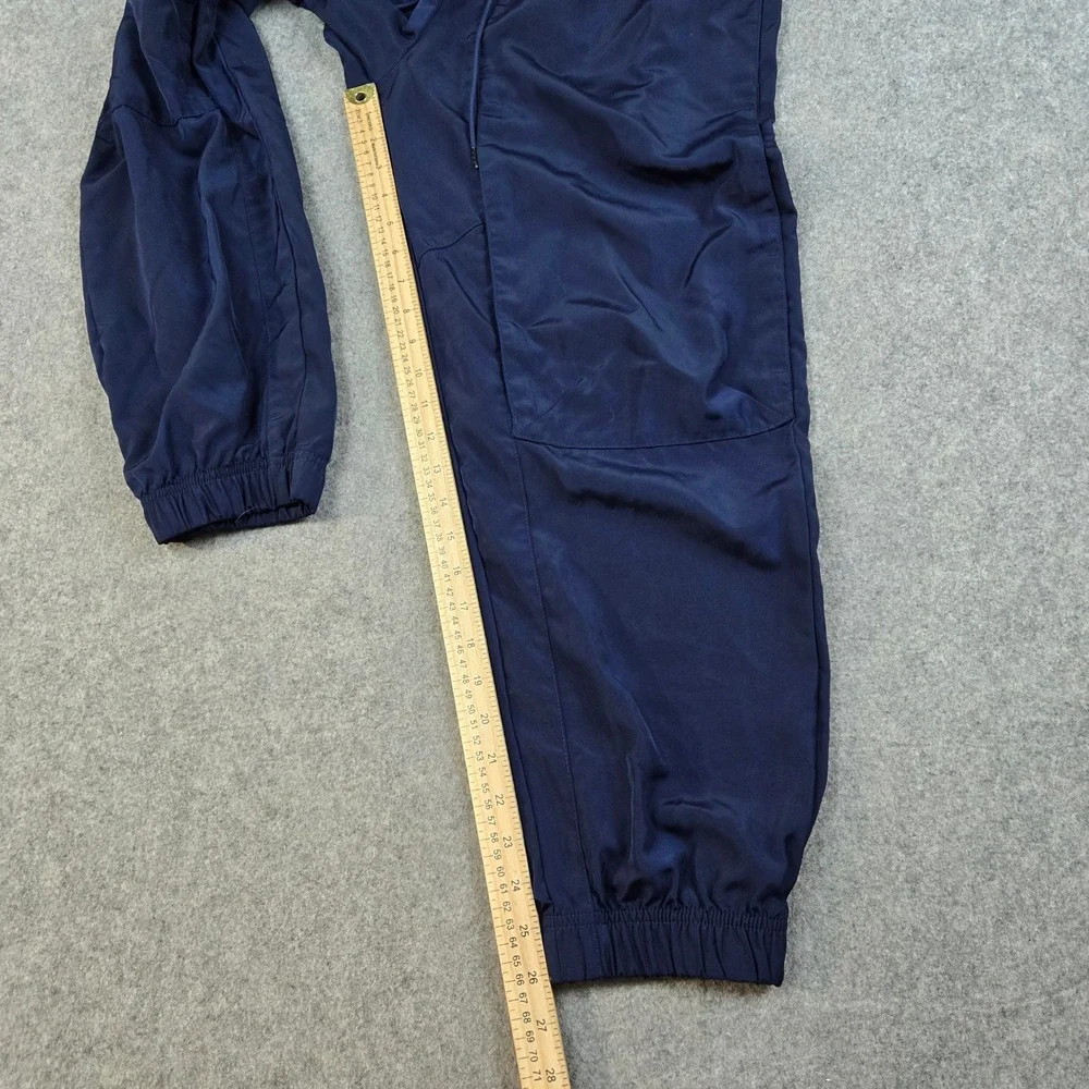 Nike‎ Track Pants Mens Medium Navy Blue Swoosh Logo Cuffed Joggers Sportswear